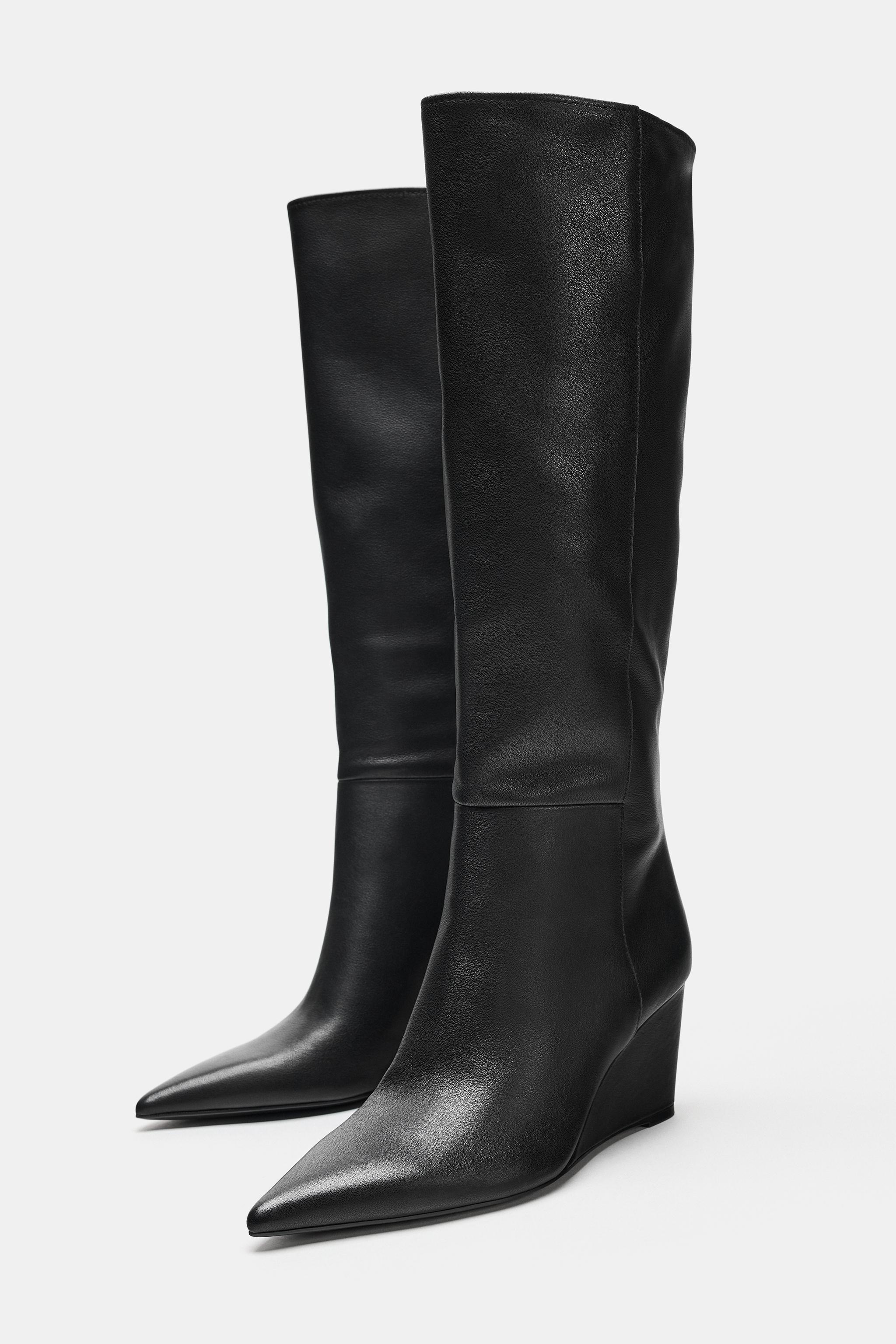 BOTTES EN CUIR À TALONS COMPENSÉS